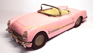 1:18 Chevrolet Corvette 1953, plech. 25 cm, setrvačník, výrobce nevyznačen, poškozený, bazar - staré hračky